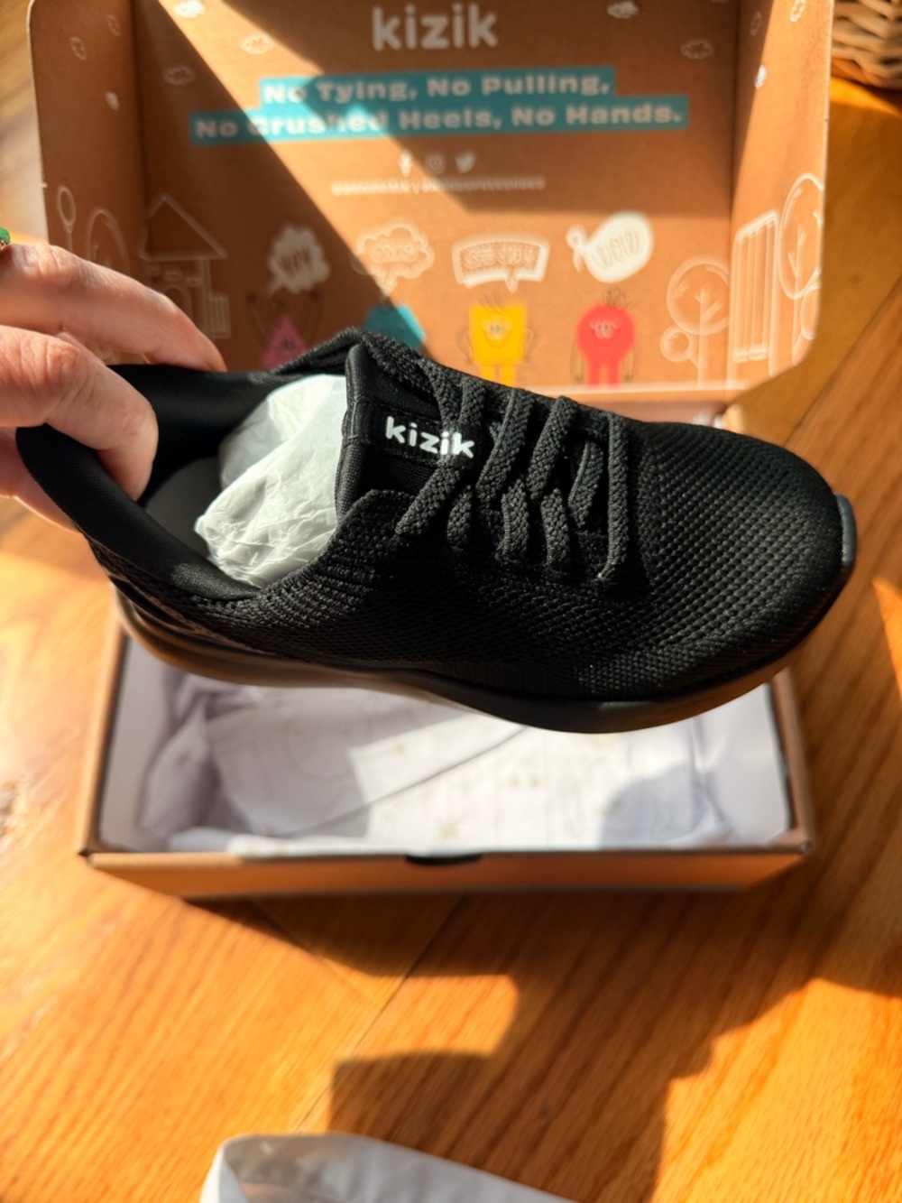 Kizik Kids Black Slip-On Knit Sneaker with Easy-Entry Design